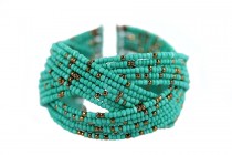 Bracelet manchette en perles turquoise ajourées