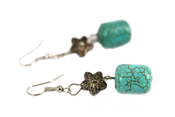 mettre boucles oreilles